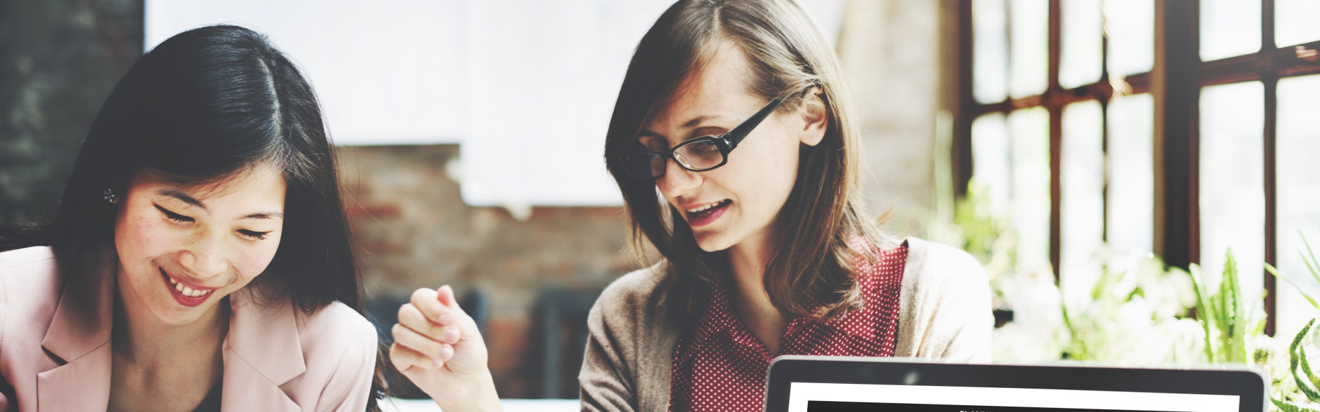 two business women working